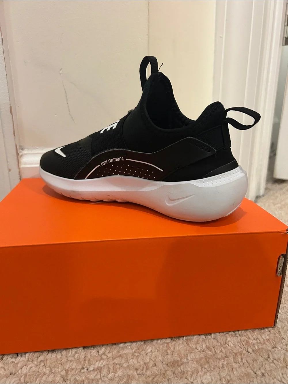 Kids Nike Black and White Slip-Ons